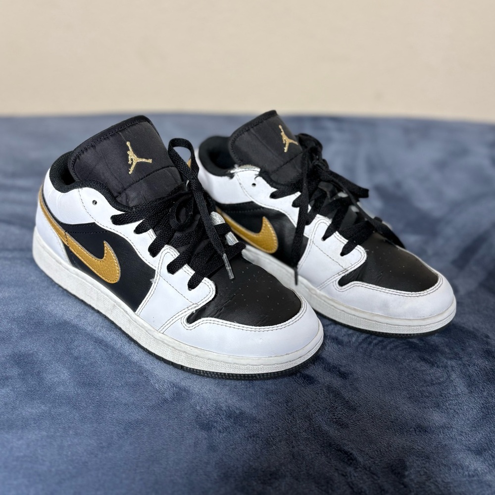 Jordan Black and Gold High-Top Sneakers